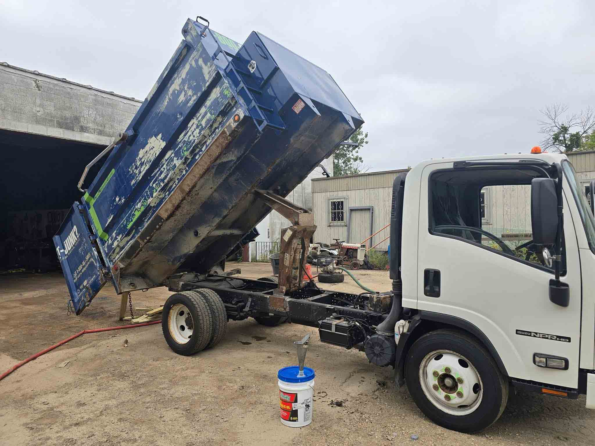 TCB Metal Works Isuzu NPR dump truck with custom fabricated bed