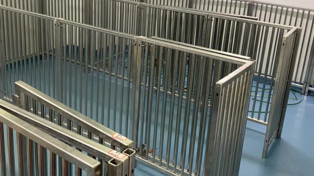 Precision-fabricated stainless steel animal enclosure bars and gates by TCB Metal Works